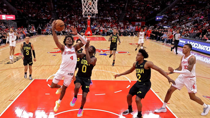 Mar 23, 2024; Houston, Texas, USA; Houston Rockets guard Jalen Green (4) shoots inside against Utah