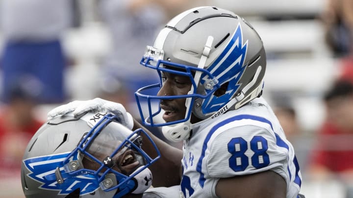 Apr 2, 2023; Houston, TX, USA;  St. Louis Battlehawks  linebacker Dallas Carmack (55) celebrates wide receiver Hakeem Butler (88) the conversion against Houston Roughnecks in the second quarter at TDECU Stadium. Mandatory Credit: Thomas Shea-USA TODAY Sports