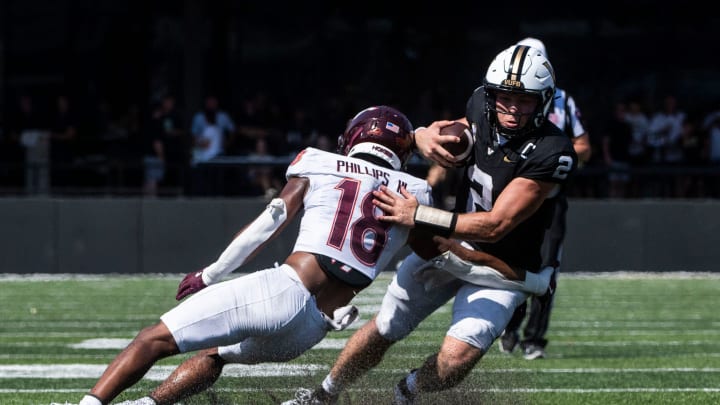 Vanderbilt ’s Diego Pavia runs the ball during Saturday’s game between Vanderbilt and Virginia Tech at FirstBank Stadium in Nashville , Tenn., Saturday, Aug. 31, 2024.