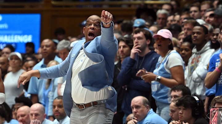 UNC basketball head coach Hubert Davis versus Duke