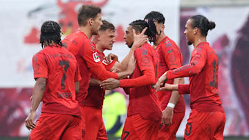 Bayern Munich players celebrating a goal against RB Leipzig.