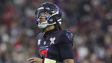 Dec 15, 2024; Houston, Texas, USA; Houston Texans quarterback C.J. Stroud (7) looks up after a play during the second quarter against the Baltimore Ravens at NRG Stadium. Mandatory Credit: Troy Taormina-Imagn Images