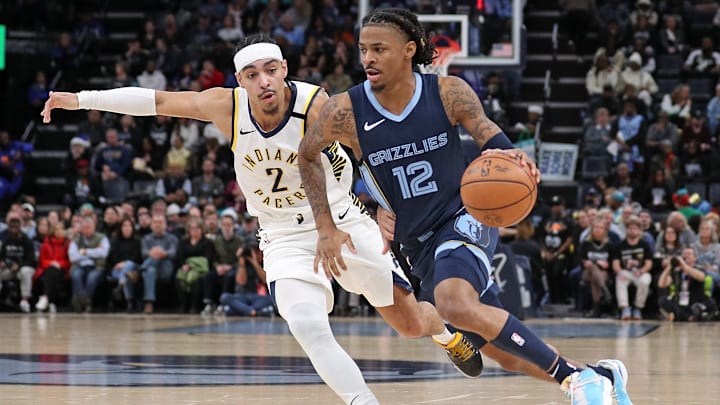 Indiana Pacers guard Andrew Nembhard (2) and Memphis Grizzlies guard Ja Morant (12).