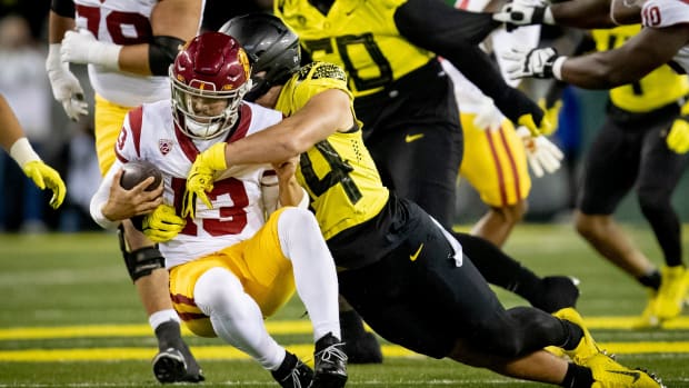 Oregon linebacker Teitum Tuioti sacks Caleb Williams from USC in 2023.