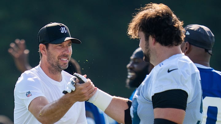Indianapolis Colts head coach Shane Steichen high fives Colts guard Quenton Nelson (56) on Wednesday, July 23, 2025, during the first day of training camp held at Grand Park in Westfield. Indianapolis Colts head coach Shane Steichen high fives Colts guard Quenton Nelson (56) on Wednesday, July 23, 2025, during the first day of training camp held at Grand Park in Westfield.