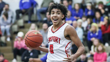 Newport's Taylen Kinney (0) reacts after scoring two of his 13 points in the first half against Washington County at Wednesday's 2023 King of the Bluegrass basketball tournament at Fairdale High School. Dec. 20, 2023