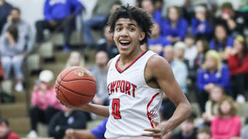 Newport's Taylen Kinney (0) reacts after scoring two of his 13 points in the first half against Washington County at Wednesday's 2023 King of the Bluegrass basketball tournament at Fairdale High School. Dec. 20, 2023