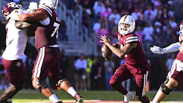 Oct 19, 2024; Starkville, Mississippi, USA; Mississippi State Bulldogs quarterback Michael Van Buren Jr. (0) runs the ball against the Texas A&M Aggies during the second quarter at Davis Wade Stadium at Scott Field. Mandatory Credit: Matt Bush-Imagn Images
