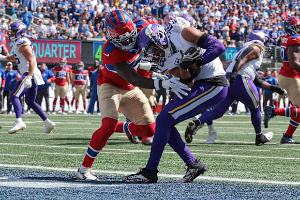 Minnesota Vikings wide receiver Justin Jefferson catches a touchdown pass.