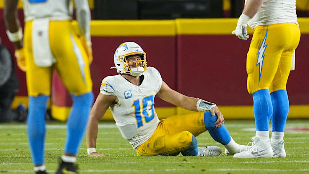 Los Angeles Chargers quarterback Justin Herbert (10) reacts after an injury during the first half against the Kansas City Chi