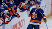 Oct 11, 2025; Elmont, New York, USA; New York Islanders defenseman Matthew Schaefer (48) celebrates his goal against the Washington Capitals with teammates during the third period at UBS Arena. The goal was the first of his NHL career. Mandatory Credit: Brad Penner-Imagn Images