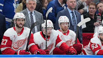 Apr 17, 2025; Toronto, Ontario, CAN; Detroit Red Wings head coach Todd McLellan watches the play against the Toronto Maple Leafs during the third period at Scotiabank Arena. Mandatory Credit: Nick Turchiaro-Imagn Images
