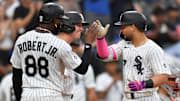 Chicago White Sox catcher Edgar Quero (7) celebrates with designated hitter Kyle Teel (8) and center fielder Luis Robert Jr. (88) after hitting a three-run home run against the Philadelphia Phillies at Rate Field. 