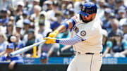 Jun 15, 2025; Seattle, Washington, USA; Seattle Mariners first baseman Rowdy Tellez (23) hits a double against the Cleveland Guardians during the second inning at T-Mobile Park. 