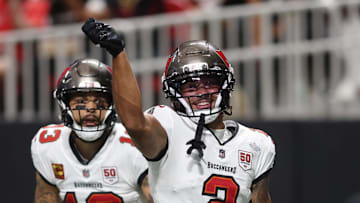 Sep 7, 2025; Atlanta, Georgia, USA; Tampa Bay Buccaneers wide receiver Emeka Egbuka (2) reacts after scoring a touchdown against the Atlanta Falcons during the second quarter at Mercedes-Benz Stadium. Mandatory Credit: Brett Davis-Imagn Images