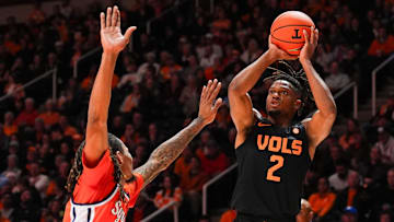 Tennessee guard Chaz Lanier (2) attempts a shot past Syracuse forward Chris Bell (4) during a college basketball game between Tennessee and Syracuse held at Thompson-Boling Arena at Food City Center in Knoxville, Tenn., on Tuesday, Dec. 3, 2024.