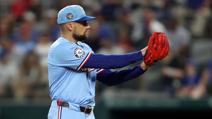 Jul 7, 2024; Arlington, Texas, USA;  Texas Rangers pitcher Nathan Eovaldi (17) starts his wide up in the first inning against the Tampa Bay Rays at Globe Life Field. Mandatory Credit: Tim Heitman-USA TODAY Sports