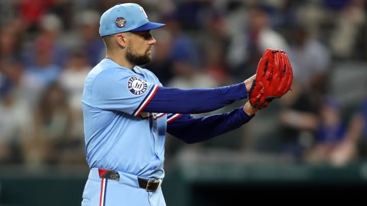 Jul 7, 2024; Arlington, Texas, USA;  Texas Rangers pitcher Nathan Eovaldi (17) starts his wide up in the first inning against the Tampa Bay Rays at Globe Life Field. Mandatory Credit: Tim Heitman-USA TODAY Sports