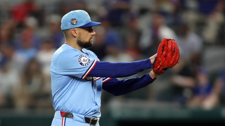 Jul 7, 2024; Arlington, Texas, USA;  Texas Rangers pitcher Nathan Eovaldi (17) starts his wide up in the first inning against the Tampa Bay Rays at Globe Life Field. Mandatory Credit: Tim Heitman-USA TODAY Sports