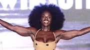 Tunde Oyeneyin walks the runway for the Sports Illustrated Swimsuit Runway Show