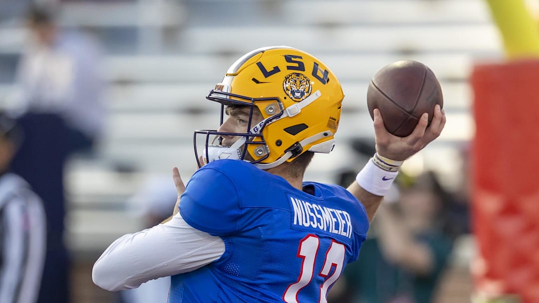 Jan 29, 2026; Mobile, AL, USA; American quarterback Garrett Nussmeier (13) of LSU throws the ball during American Senior Bowl practice at Hancock Whitney Stadium. Mandatory Credit: Vasha Hunt-Imagn Images