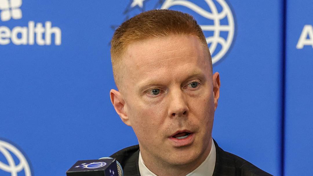 Orlando Magic head coach Sean Sweeney takes media questions during a press conference.