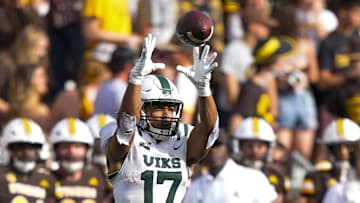 Sep 9, 2023; Laramie, Wyoming, USA; Portland State Vikings running back Quincy Craig (17) makes a catch against the Wyoming Cowboys during the fourth quarter at Jonah Field at War Memorial Stadium. Mandatory Credit: Troy Babbitt-Imagn Images
