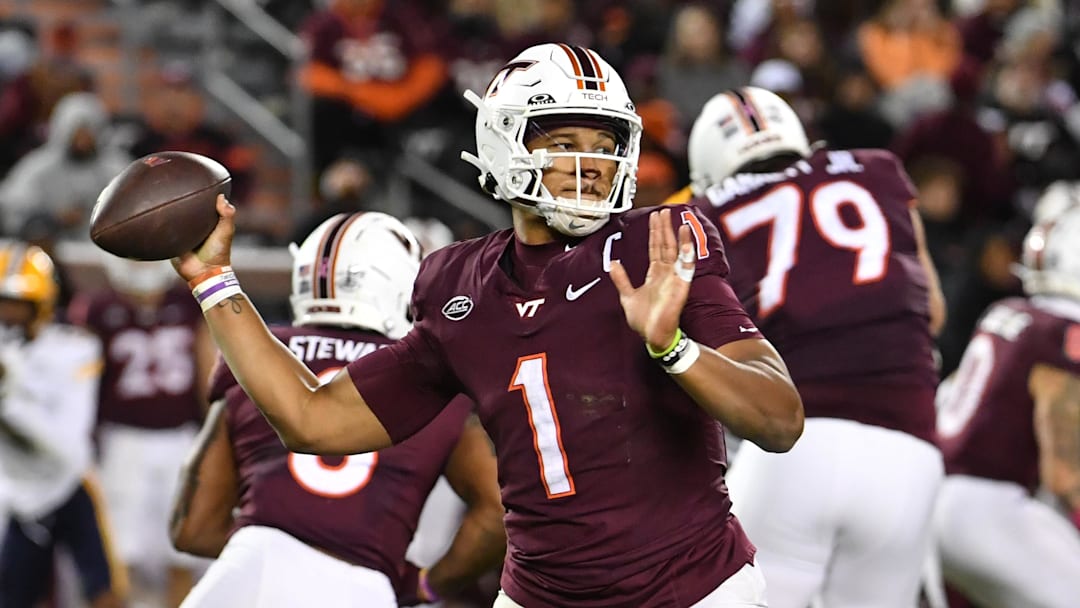 Oct 24, 2025; Blacksburg, Virginia, USA; Virginia Tech Hokies quarterback Kyron Drones (1) throws a pass against the California Golden Bears during the second quarter at Lane Stadium. Mandatory Credit: Brian Bishop-Imagn Images