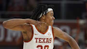 Jan 25, 2025; Austin, Texas, USA; Texas Longhorns guard Tre Johnson (20) reacts after scoring a three point basket during the second half against the Texas A&M Aggies at Moody Center. Mandatory Credit: Scott Wachter-Imagn Images