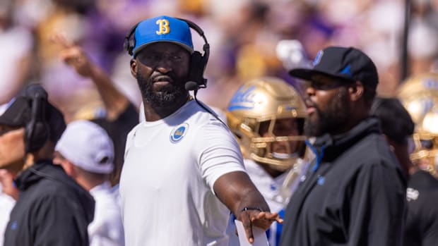 UCLA Bruins head coach DeShaun Foster looks on during the first half against the LSU Tigers at Tiger Stadium