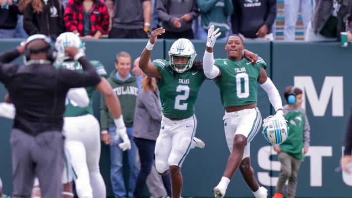 Oct 30, 2021; New Orleans, Louisiana, USA;  Tulane Green Wave linebacker Marvin Moody (0) reacts to sacking Cincinnati Bearcats quarterback Desmond Ridder (9) in the end zone for a safety during the first half at Yulman Stadium. Mandatory Credit: Stephen Lew-USA TODAY Sports