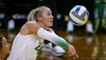 Oregon outside hitter Daley McClellan sets the ball as Oregon volleyball takes on Portland State in an exhibition match Saturday, Aug. 19, 2023, at Matthew Knight Arena in Eugene.