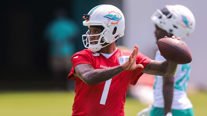 Jun 10, 2025; Miami, FL, USA; Miami Dolphins quarterback Tua Tagovailoa (1) throws the football during mandatory minicamp at Hard Rock Stadium. Mandatory Credit: Sam Navarro-Imagn Images