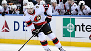 Ottawa Senators right wing Drake Batherson skates with the puck against the New York Rangers.