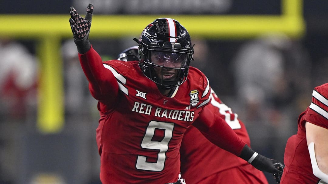Dec 6, 2025; Arlington, TX, USA; Texas Tech Red Raiders linebacker Romello Height (9) celebrates during the game between the Red Raiders and the Cougars at AT&T Stadium. Mandatory Credit: Jerome Miron-Imagn Images