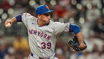 Aug 23, 2025; Cumberland, Georgia, USA; New York Mets relief pitcher Edwin Diaz (39) pitches against the Atlanta Braves during the ninth inning at Truist Park. Mandatory Credit: Dale Zanine-Imagn Images
