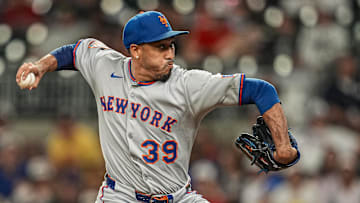 Aug 23, 2025; Cumberland, Georgia, USA; New York Mets relief pitcher Edwin Diaz (39) pitches against the Atlanta Braves during the ninth inning at Truist Park. Mandatory Credit: Dale Zanine-Imagn Images