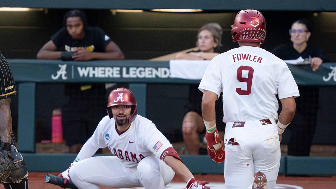 May 29, 2026; Tuscaloosa, AL, USA; Alabama base runner Bryce Fowler (9) comes home as Alabama batter Jason Torres (32) signals for a slide in the Tuscaloosa NCAA Regional baseball game between Alabama and Alabama State in Sewell-Thomas Stadium.