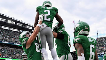 Oct 26, 2025; Philadelphia, Pennsylvania, USA; Philadelphia Eagles wide receiver Jahan Dotson (2) celebrates with teammates after scoring a touchdown against the New York Giants in the fourth quarter at Lincoln Financial Field.