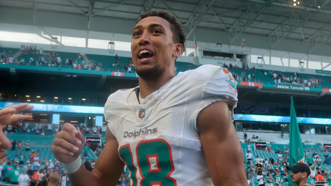Nov 9, 2025; Miami Gardens, Florida, USA; Miami Dolphins wide receiver Nick Westbrook-Ikhine (18) celebrates with fans after defeating the Buffalo Bills at Hard Rock Stadium. Mandatory Credit: Sam Navarro-Imagn Images