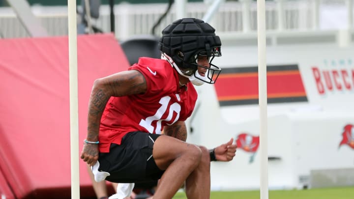 Jul 25, 2024; Tampa, FL, USA;  Tampa Bay Buccaneers wide receiver Trey Palmer (10) works out during training camp at AdventHealth Training Center. Mandatory Credit: Kim Klement Neitzel-USA TODAY Sports