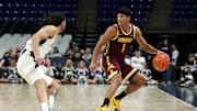 Feb 4, 2025; University Park, Pennsylvania, USA; Minnesota Golden Gophers guard Isaac Asuma (1) dribbles the ball up the court as Penn State Nittany Lions guard Freddie Dilione V (4) defends during the second half at Bryce Jordan Center. Penn State 69-61. Mandatory Credit: Matthew O'Haren-Imagn Images