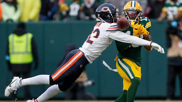 Chicago Bears cornerback Terell Smith (32) breaks up a pass intended for Green Bay Packers wide receiver Dontayvion Wicks (13