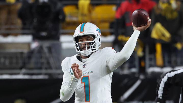 Dec 15, 2025; Pittsburgh, Pennsylvania, USA; Miami Dolphins quarterback Tua Tagovailoa (1) throws in the second quarter against the Pittsburgh Steelers at Acrisure Stadium. Mandatory Credit: Charles LeClaire-Imagn Images