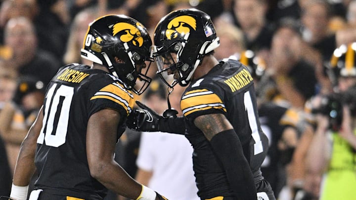 Sep 30, 2023; Iowa City, Iowa, USA; Iowa Hawkeyes linebacker Nick Jackson (10) and defensive back Xavier Nwankpa (1) react against the Michigan State Spartans during the second quarter at Kinnick Stadium. Mandatory Credit: Jeffrey Becker-Imagn Images Sep 30, 2023; Iowa City, Iowa, USA; Iowa Hawkeyes linebacker Nick Jackson (10) and defensive back Xavier Nwankpa (1) react against the Michigan State Spartans during the second quarter at Kinnick Stadium. Mandatory Credit: Jeffrey Becker-Imagn Images