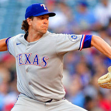 Jul 7, 2025; Anaheim, California, USA; Texas Rangers pitcher Jacob deGrom (48) throws against the Los Angeles Angels during the first inning at Angel Stadium.
