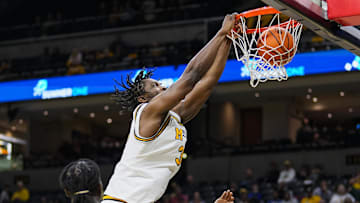 Nov 14, 2024; Columbia, Missouri, USA; Missouri Tigers center Josh Gray (33) dunks the ball during the second half against the Mississippi Valley State Delta Devils at Mizzou Arena. Mandatory Credit: Jay Biggerstaff-Imagn Images