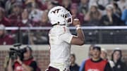 Nov 15, 2025; Tallahassee, Fla.; Virginia Tech quarterback Kyron Drones (1) celebrates a touchdown against Florida State.