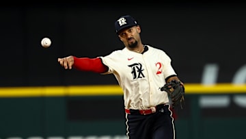 Texas Rangers second baseman Marcus Semien (2) throws to first base during the seventh inning against the Philadelphia Phillies at Globe Life Field. 