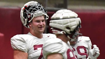 April 9, 2024; Tuscaloosa, Alabama, USA; Alabama offensive lineman Wilkin Formby (75) smiles at a teammate during practice in the Hank Crisp Indoor Practice Facility at the University of Alabama.
